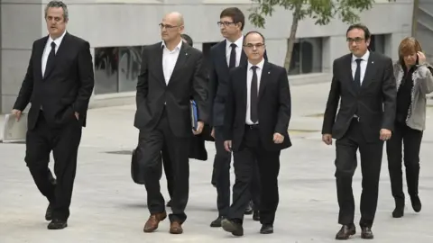 AFP Members of the deposed Catalan regional government arrive at a court in Madrid