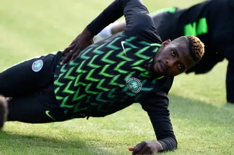 AFP Nigeria"s forward Kelechi Iheanacho warms up during a training session at Essentuki Arena in Yessentuki, southern Russia, on June 18, 2018