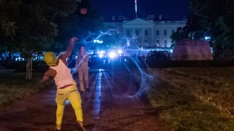 AFP Protests continued outside the White House overnight