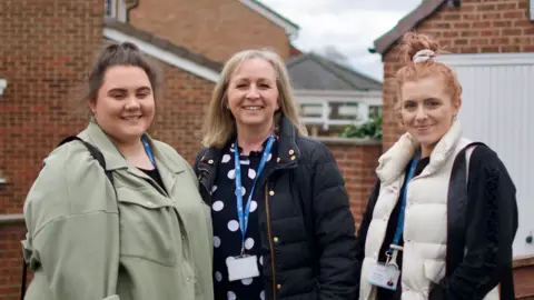 BBC Helen Lofts with two of her staff Erin Woodhouse and Sophie Moore