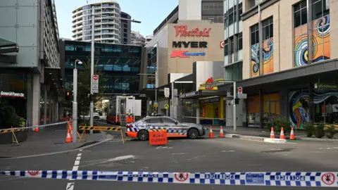 DEAN LEWINS/EPA-EFE/REX/Shutterstock Cordon outside Westfield Bondi Junction