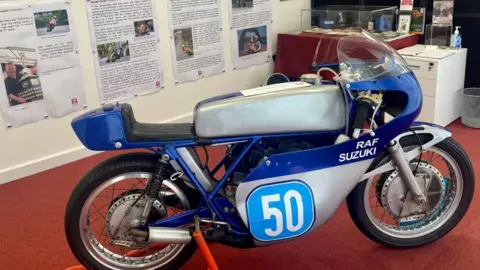 Rushen Heritage Trust The Suzuki motorbike ridden to victory by Richard Fitzsimmons in the 1983 Lightweight Classic.