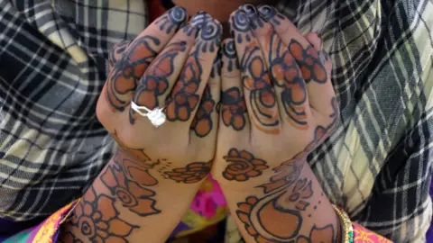 Getty Images File photo of a Muslim woman praying