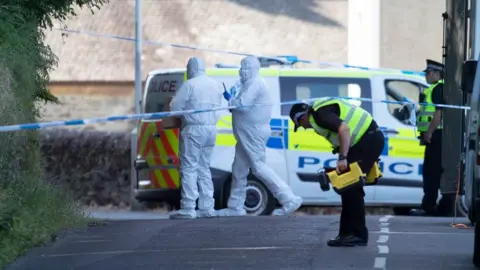 PA Forensic experts and police at scene