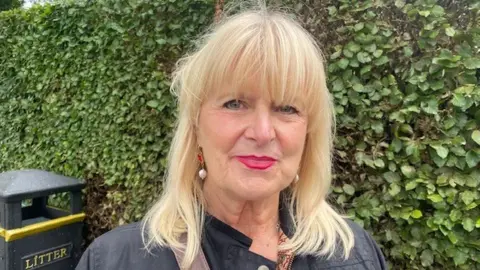 BBC Louise Poynton, a lady with blonde hair