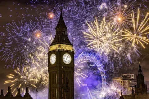 Dan Kitwood / Getty Images Fireworks light up the London skyline over Big Ben and the London Eye just after midnight on 1 January 2023