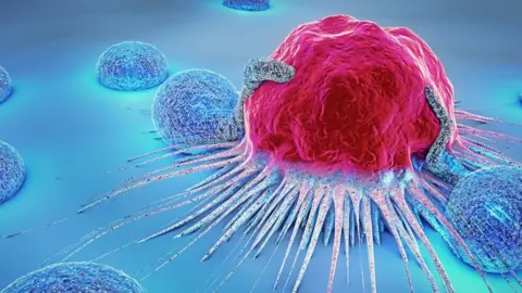 Getty Images/man_at_mouse A cancer cell