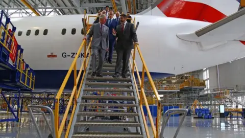 Getty Images The Prince of Wales and BA chief executive Alex Cruz have a tour of the British Airways Maintenance Centre in Rhoose earlier this year