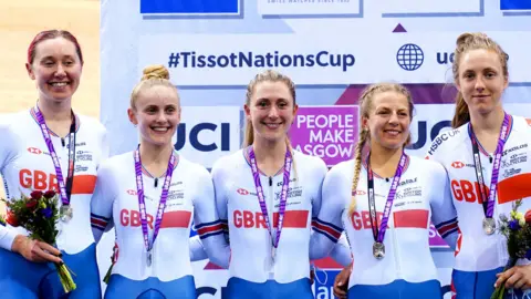 Great Britain's Katie Archibald, Megan Barker, Laura Kenny, Neah Evans and Josie Knight on the podium after winning silver in the Women's Team Pursuit on day one of the UCI Track Nations Cup 2022
