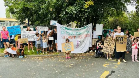 Gabi Besevic-Simpson protest outside Buckhurst Community School