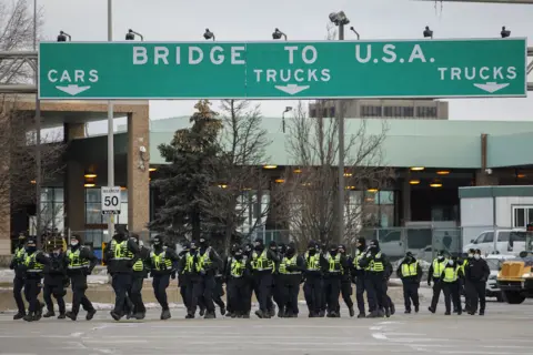 Getty Images Police line the bridge