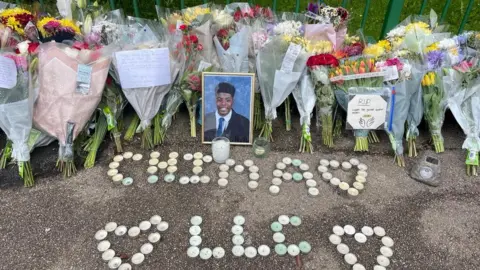 Dave Godfrey Flowers left for Chima Osuji