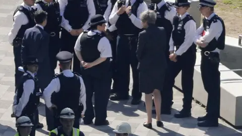 AFP/Getty Theresa May visits Grenfell Tower