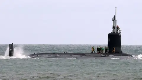Getty Images The USS Indiana, a nuclear-powered US Navy Virginia-class fast attack submarine, departs Port Canaveral in Florida on October 1, 2018