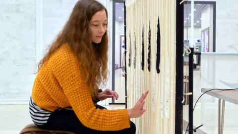 Fabrice Gagos Lace piano on display in Nottingham