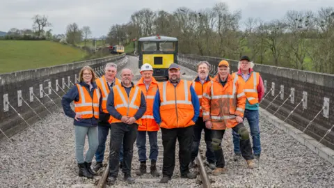 Jack Boskett Team picture at the handover ceremony of the Stanway Viaduct