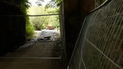 Temporary fencing at the Crooked House