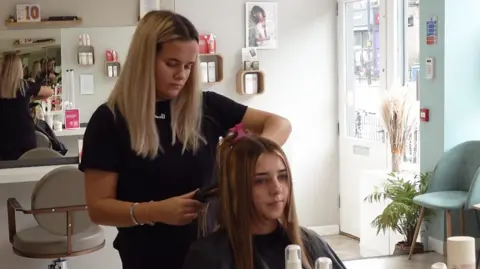 Kerry Anderson set up the 'Brave, Strong, Beautiful' salon which provides training for young people.