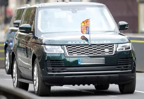 Getty Images Britain's Queen Elizabeth II is driven in a Range Rover to the Houses of Parliament for the State Opening of Parliament