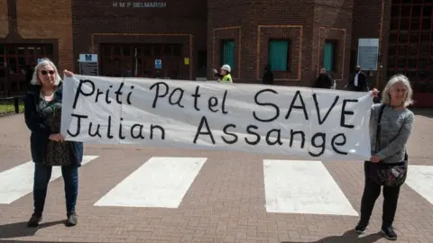 Getty Images Two women protest for Julian Assange's release outside Belmarsh Prison