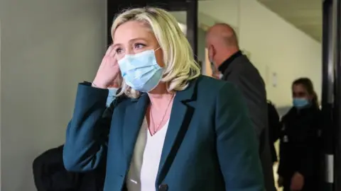 EPA French member of Parliament and president of the Rassemblement National far-right party Marine Le Pen outside court on 10 February