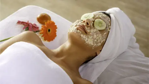 Getty Images A woman with an oatmeal face mask