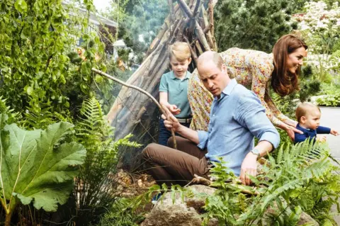 AFP The Duke and Duchess of Cambridge with Prince George and Prince Louis at the duchess's Back to Nature garden at Chelsea Flower Show