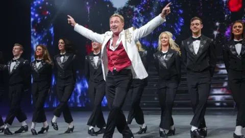 Getty Images Michael Flatley with Lord of the Dance cast