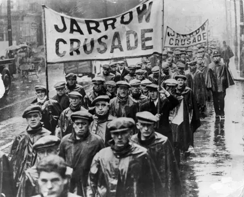 Getty Images The 1936 month-long walk saw hundreds march from of Jarrow on Tyneside to London to protest to Parliament against unemployment