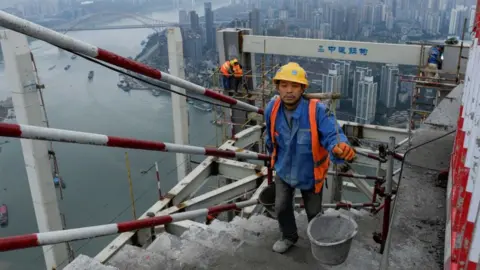 Getty Images A construction worker in the southern China city of Chongqing