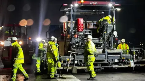 Construction team on Stansted Airport runway