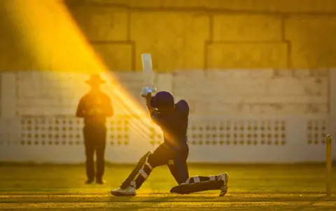 Muhammed Arbaz Khushdil Shah batting during a cricket match in National Stadium, Karachi, Pakistan