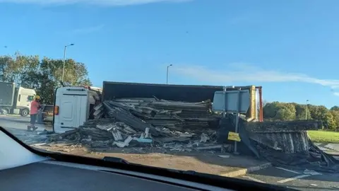 Overturned lorry on Lancaster roundabout