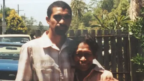 LOVE FAMILY Daniel Love (L) and a relative