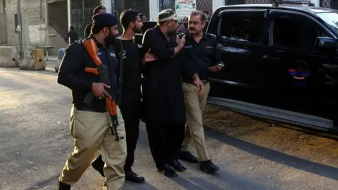EPA Pakistani police detain supporters of jailed former prime minister Imran Khan