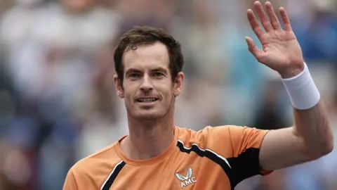 Andy Murray of Great Britain celebrates after defeating David Goffin