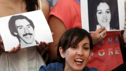 Reuters A woman named Adriana (she wished not to release her current last name), who was taken away from her mother during the 1976-1983 Argentine dictatorship, speaks during a news conference at the human rights organization Abuelas de Plaza de Mayo (Grandmothers of Plaza de Mayo) headquarters in Buenos Aires, Argentina December 5, 2017