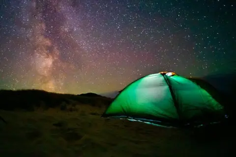 Kerr Rankin Camping at night