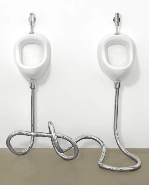 Galerie Gerhardsen Gay Marriage (2010) consists of two wall-mounted urinals connected by twisted chrome pipes in a lovers' knot