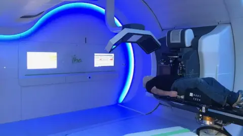 Nick Haves Nick Haves going into the proton beam therapy machine
