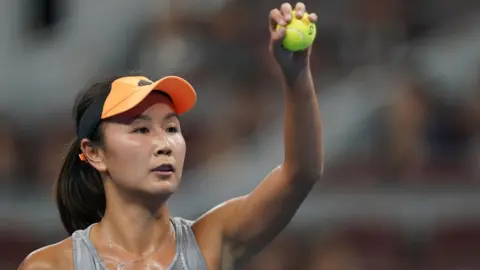 Getty Images Peng Shuai of China in action against Daria Kasatkina of Russia during women's singles first round match 2019 China Open - Day 1 on September 28, 2019 in Beijing, China