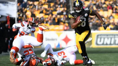 Getty Images Steelers player runs away from Browns