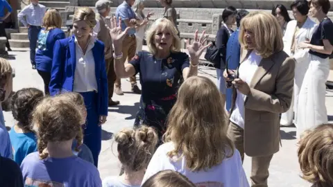 Simon Dawson/Number 10 Downing Street Carrie Johnson, Jill Biden and Brigitte Macron.