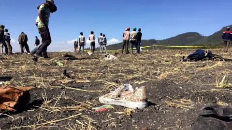 Reuters People at the scene of the Ethiopian Airlines Flight ET 302 plane crash, near the town of Bishoftu, southeast of Addis Ababa, Ethiopia March 10, 2019