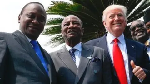 Donald Trump posing with African leaders in Italy