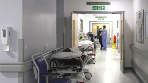 People waiting in corridors in A&E