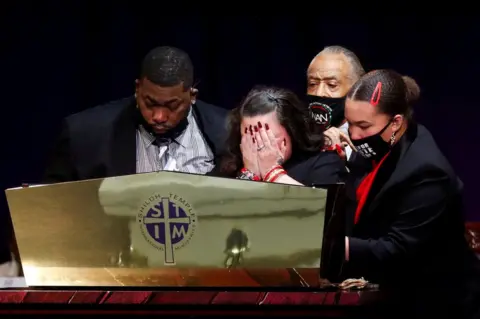 Octavio Jones / Reuters Katie Wright, the mother of Daunte Wright, weeps at his funeral service at Shiloh Temple International Ministries in Minneapolis, Minnesota, US
