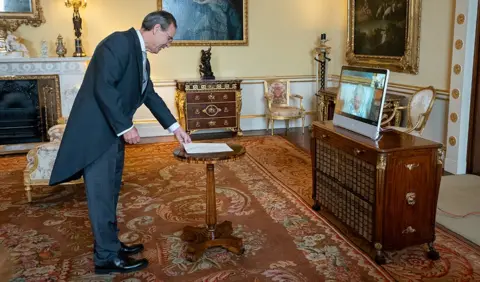 PA Media Miguel Berger presented his credentials to Queen Elizabeth II via secure videolink in 2022
