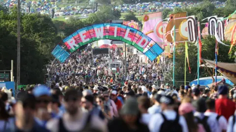 Aaron Chown/PA Media Crowds on the second day of Glastonbury festival