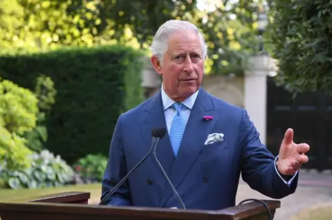 Getty Images Prince Charles speaks at a reception for EU and Balkan leaders in the gardens of St James's Palace in central London on 10 July 2018